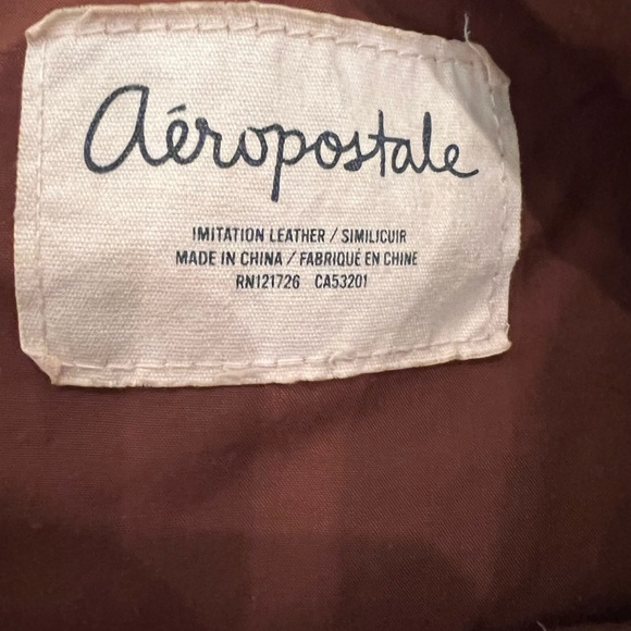 Brown Textured Backpack - Picture 2 of 12